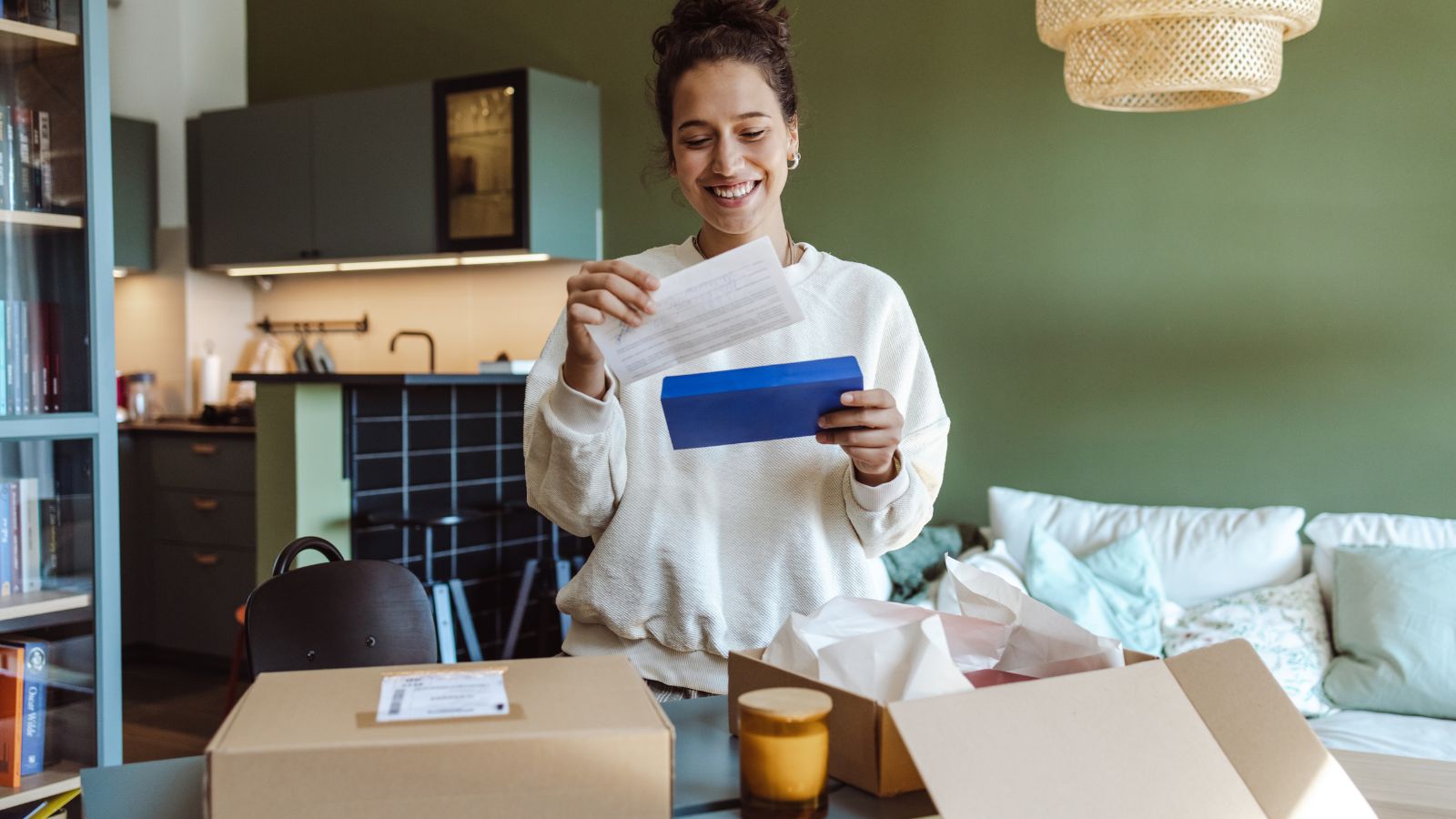 Young woman received a subscription box.